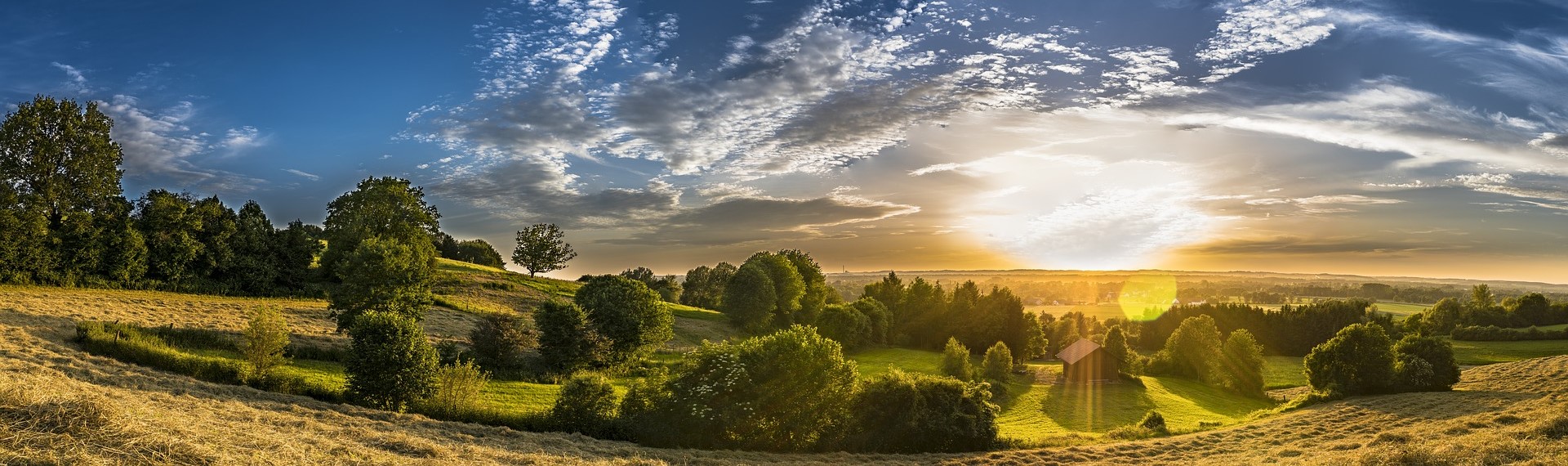 Landschaft mit Sonnenunterganf